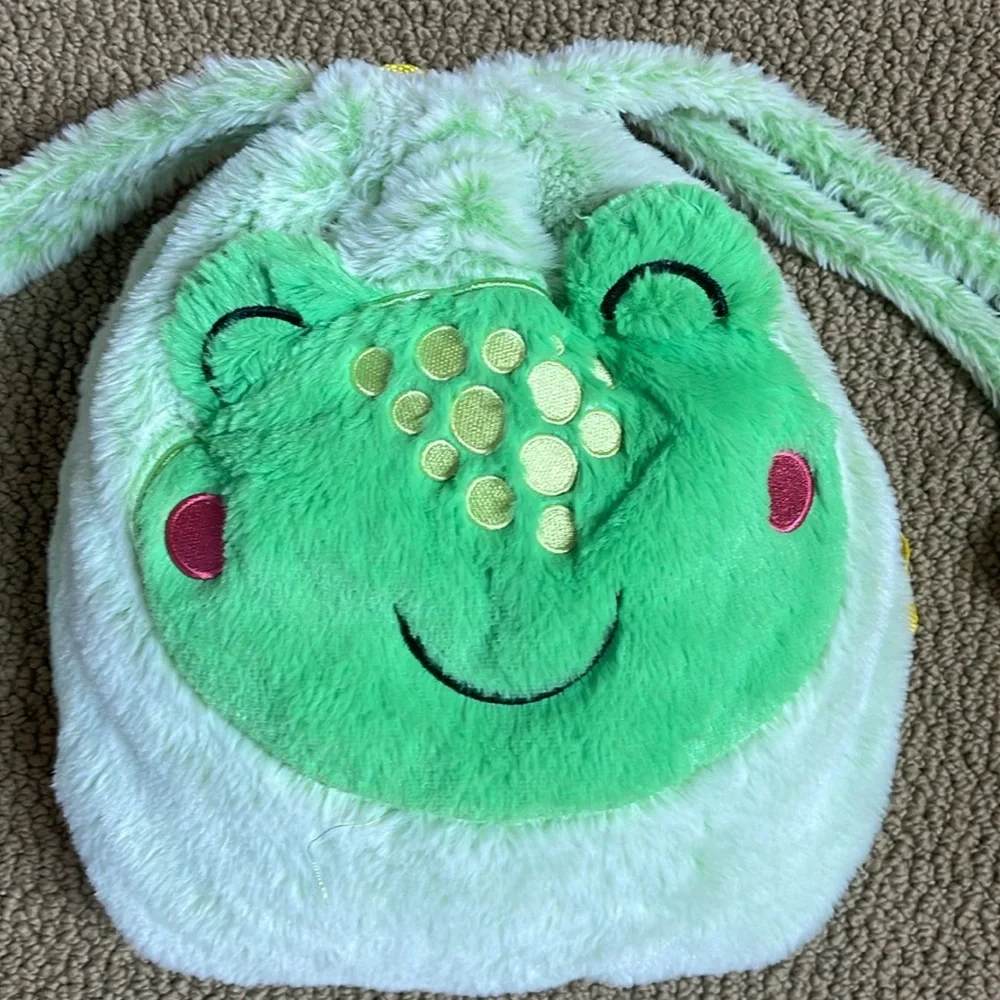 Frog backpack blanket. Very cute and soft.
